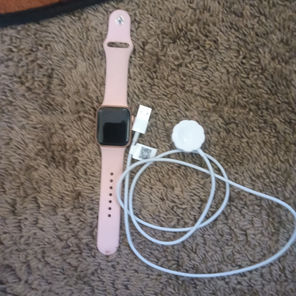 Smartwatch with Pink Band and Charger